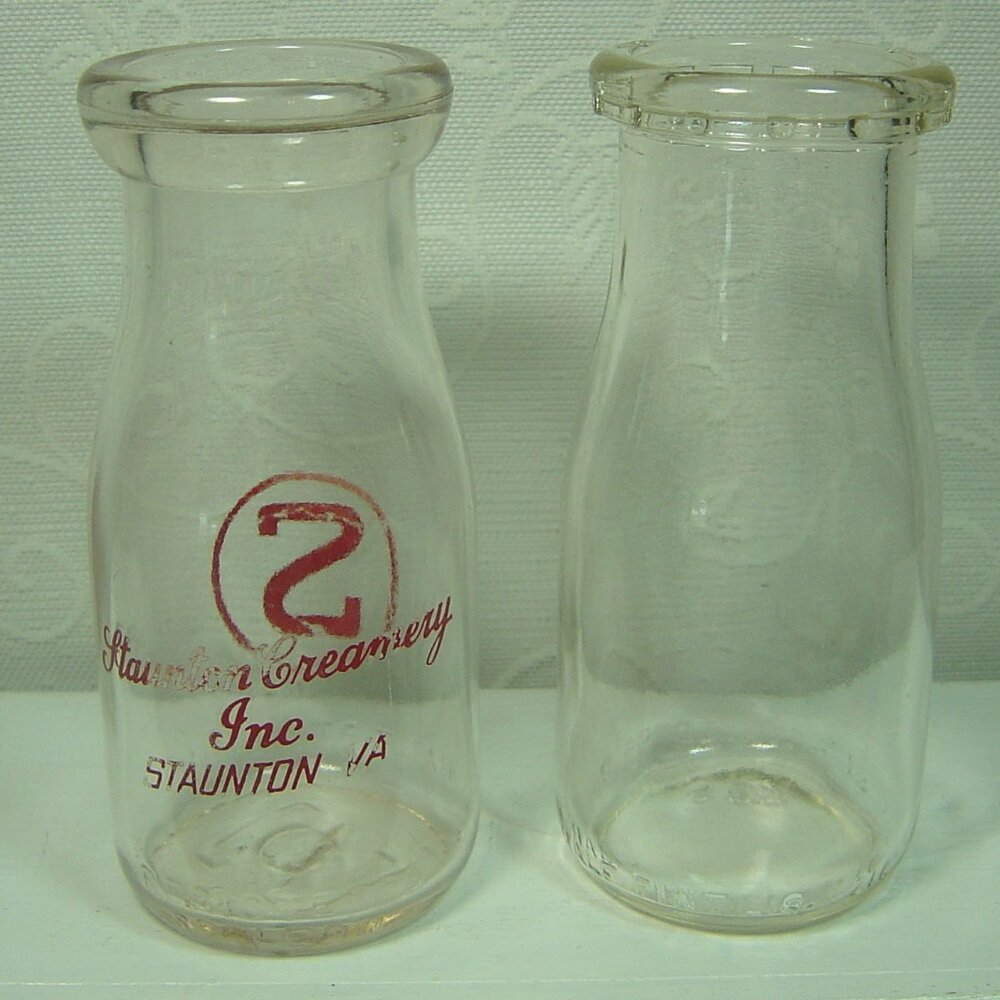 2 vintage glass half pint (8 oz.) milk or cream bottles